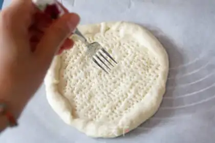 Make Triple cheese tuna pizza step 17