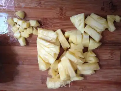 Make Pineapple omegranate strawberry step 1