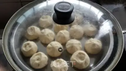 Make Pork cabbage buns step 11