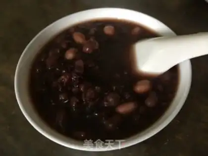 Make Black rice, red bean date congee step 4