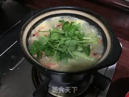 Make Crab-crayfish congee step 10