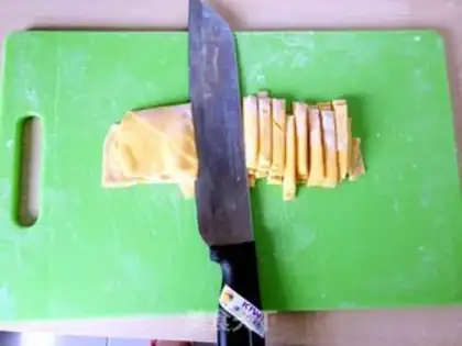 Make Hands on pumpkin noodles step 4