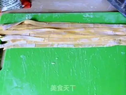 Make Hands on pumpkin noodles step 6