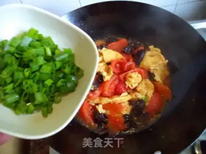 Make Tomato fried eggs step 11