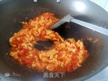 Make Tomato fried eggs step 9