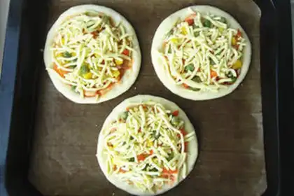 Make Mini shrimp veggie pizza step 9