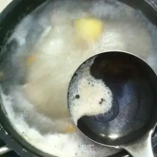 Make Fresh fish head soup step 5