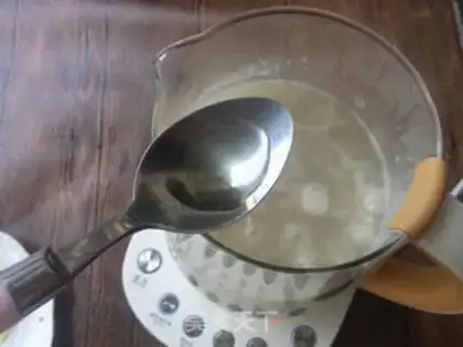 Make Dried fish congee step 8