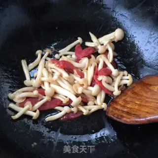 Make White mushroom fried sausage step 8