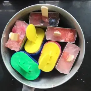 Make A colorful fruit popsicle step 5