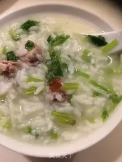 Make Celery roasted duck porridge step 2