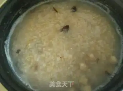 Make Skinned rice and egg shrimp congee step 4