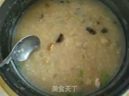 Make Skinned rice and egg shrimp congee step 5