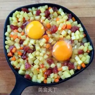 Make Potato carrot sausage and eggs step 5