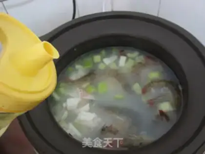 Make Celery seafood congee step 10
