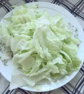 Make The cabbage makes black rice cake step 2