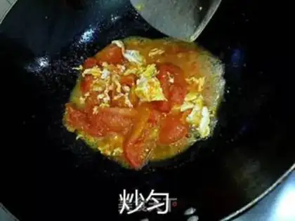 Make Tomato fried eggs step 12