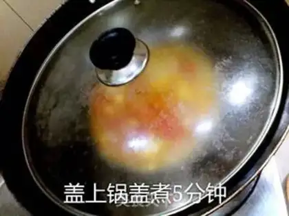 Make Tomato fried eggs step 14