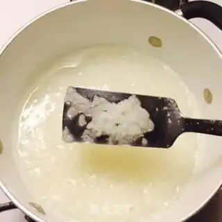 Make Porridge and eggs and pork porridge step 3