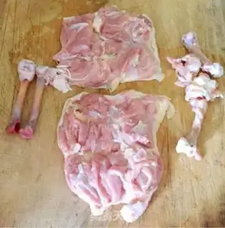 Make A veggie roll on a tin paper chicken leg step 1