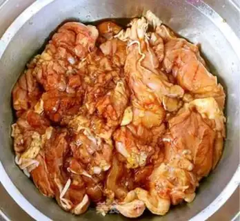 Make A veggie roll on a tin paper chicken leg step 4