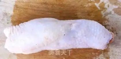 Make A veggie roll on a tin paper chicken leg step 7