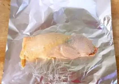 Make A veggie roll on a tin paper chicken leg step 8