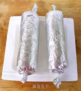 Make A veggie roll on a tin paper chicken leg step 9