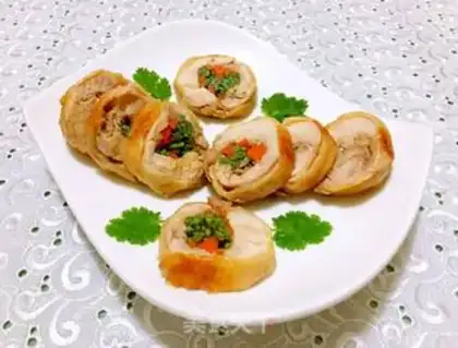 Make A veggie roll on a tin paper chicken leg step 12