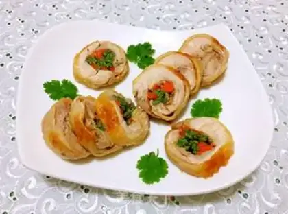 Make A veggie roll on a tin paper chicken leg step 14