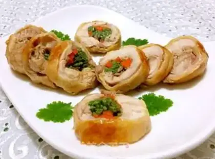 Make A veggie roll on a tin paper chicken leg step 17