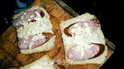 Make A sandwich with sausage toast step 1