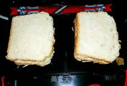 Make A sandwich with sausage toast step 2