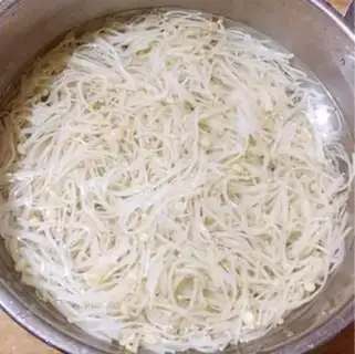 Make Spicy golden needle mushrooms step 5