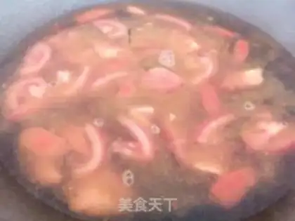 Make Tomato squid soup step 4