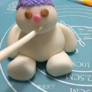 Make Snow dolls flipping candy cakes step 17