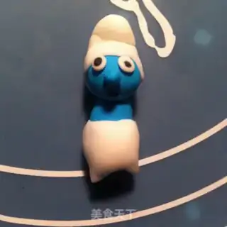 Make The smurf rolls the sugar cake step 11