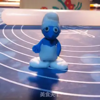 Make The smurf rolls the sugar cake step 15