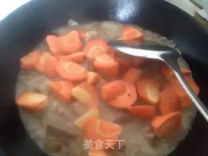 Make Onion carrots, goat meat step 9