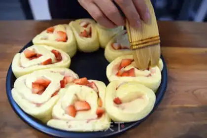 Make Sweet cheese strawberry rolls step 8