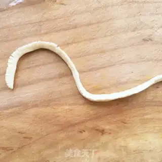 Make Little tiger flower step 13