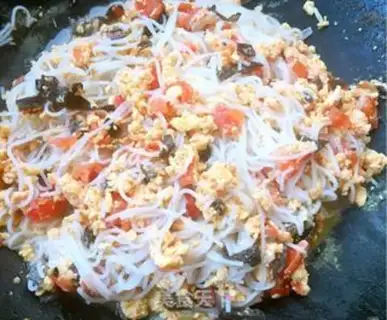 Make Tomato eggs and wooded rice wire step 16