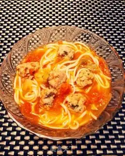 Make Tomato meatball noodles step 9