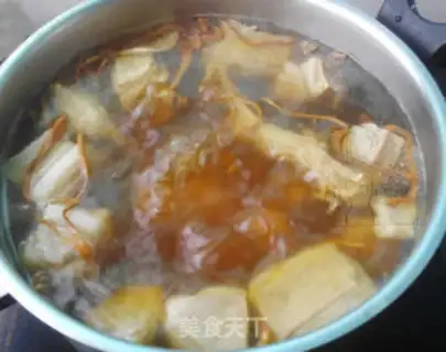 Make Worm and herbs and goat soup step 5