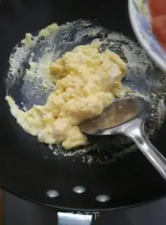 Make Fried tomato eggs step 7