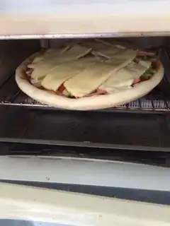 Make Luxury double-packed pizza step 16
