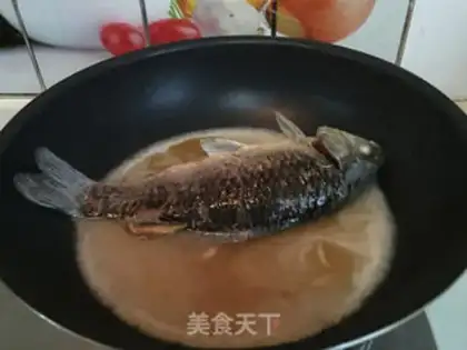 Make Soy sauce fish soup step 6