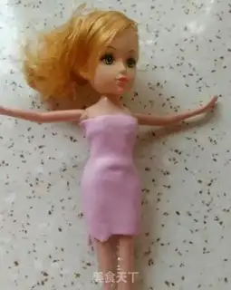 Make Barbie dolls flipping candy cake step 11