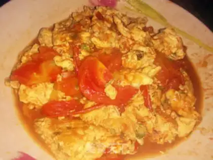Make Tomato fried eggs step 7