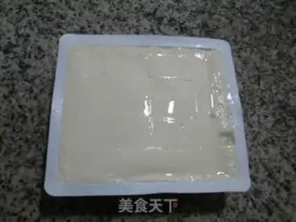 Make Squeeze the tofu and cook the flowers step 1